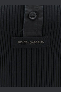 Dolce &amp; Gabbana men’s black ribbed cotton sweater with sleek button closure and branded label