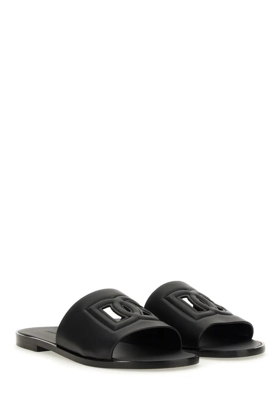 Dolce &amp; Gabbana men’s black leather slide sandals with prominent embossed interlocking logo design