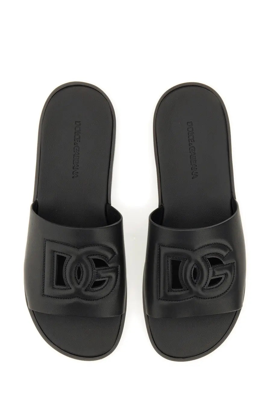 Dolce &amp; Gabbana men’s black slide sandals with bold embossed DG logo on the footbed for casual wear