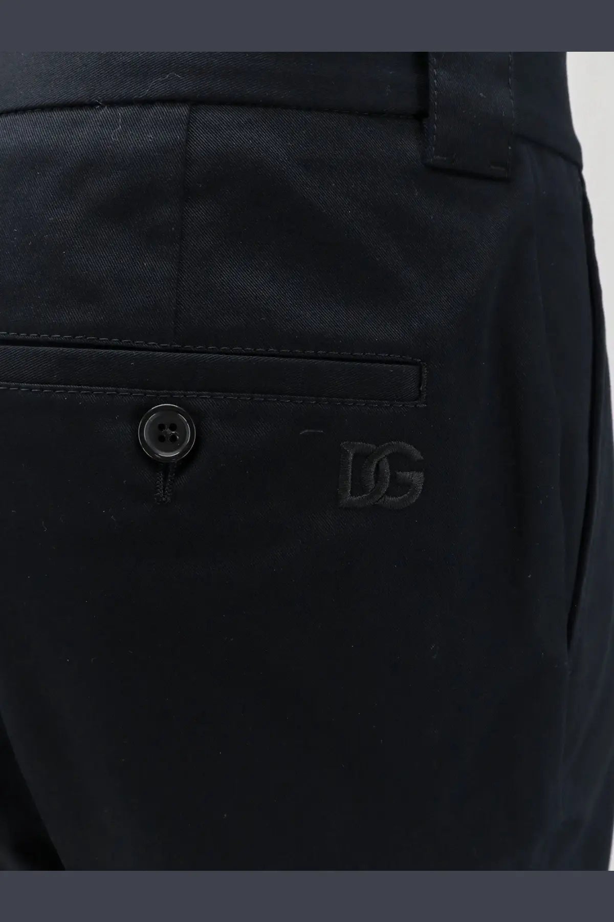 Dolce &amp; Gabbana men’s black sartorial stretch cotton trousers with subtle embroidered logo on front pocket