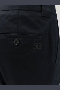 Dolce &amp; Gabbana men’s black sartorial stretch cotton trousers with subtle embroidered logo on front pocket