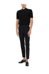 Dolce &amp; Gabbana men’s black silk polo shirt with short sleeves and subtle contrast stitching on collar and sleeves