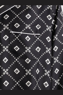 Dolce &amp; Gabbana men’s black silk satin pajama top with white dc logo pattern and front pocket