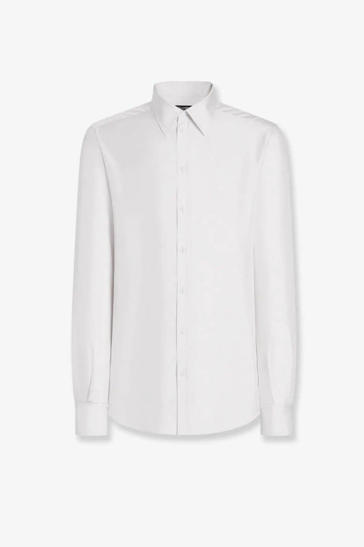 A crisp white dolce and gabbana men’s silk shirt with long sleeves classic collar and button down front