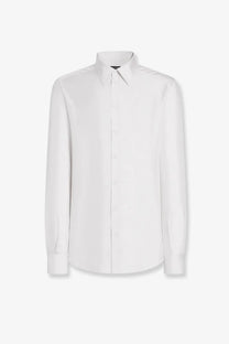 A crisp white dolce and gabbana men’s silk shirt with long sleeves classic collar and button down front