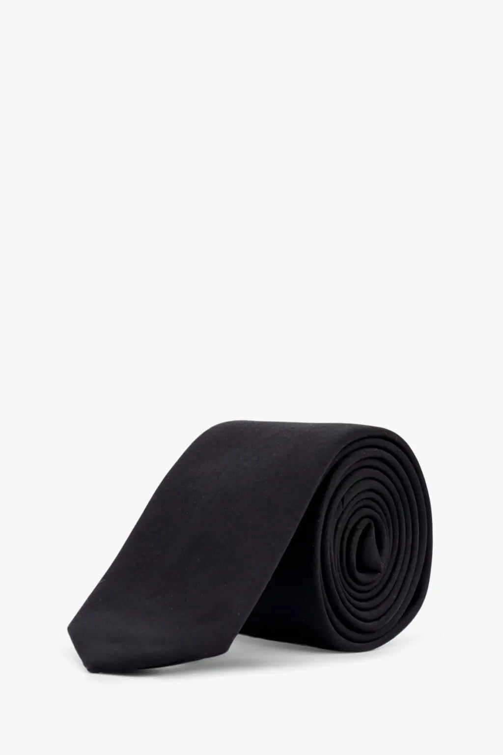 A sleek black silk tie by dolce and gabbana neatly rolled displayed against a clean white background