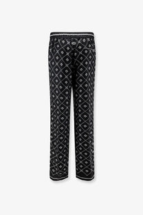 Dolce &amp; Gabbana men’s black silk trousers with white geometric diamond pattern and matching trim