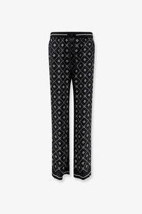Dolce &amp; gabbana men’s black silk trousers with black and white geometric patterned wide-leg drawstring pants