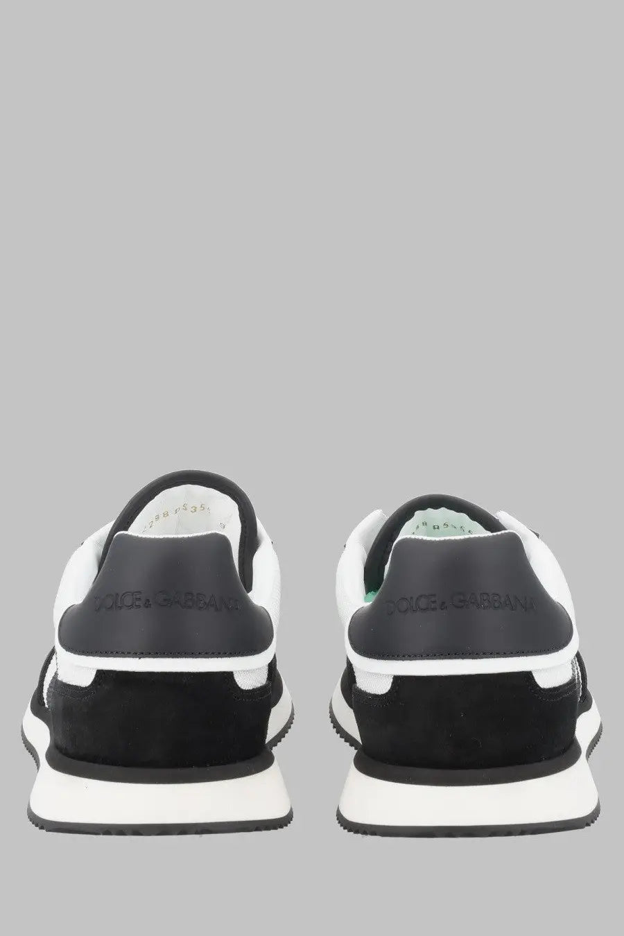 Dolce &amp; Gabbana men’s black and white sneaker with sleek suede and leather design dg cushion multicolor style