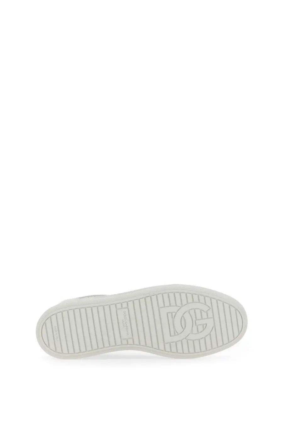 White rubber sole with embossed dg logo and textured grip on dolce gabbana men’s sneaker saint tropez white