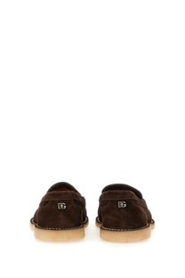 Brown suede slip-on loafers with subtle dg logo on the heel dolce gabbana men’s beige suede loafer back view