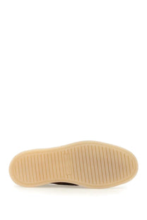 Beige rubber sole with ribbed texture and subtle branding embossed near the heel of dolce and gabbana men’s suede loafer