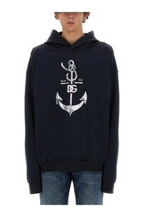 Dolce &amp; Gabbana men’s black hoodie with distressed white anchor graphic featuring Milan Italy and brand logo
