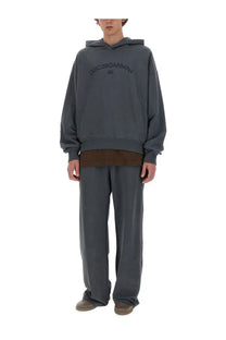Dolce &amp; Gabbana men’s dark gray oversized hoodie with faded embroidered logo across the chest