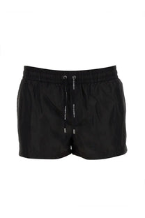 Dolce &amp; Gabbana men’s black swim trunks made of lightweight fabric with subtle white branding on the drawstring