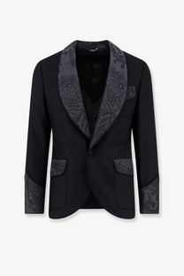 Dolce and Gabbana men’s black virgin wool blend tuxedo jacket with dark gray paisley trim on lapels cuffs and pockets