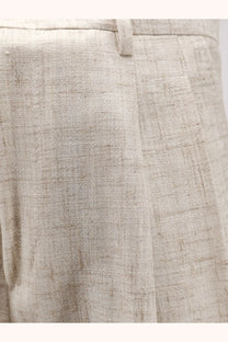Beige dolce and gabbana men’s tailored linen and viscose blend trousers with subtle textured weave and clean stitching