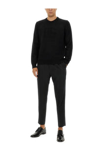 Dolce &amp; Gabbana men’s black wool jersey crewneck sweater with subtle textured logo on the chest