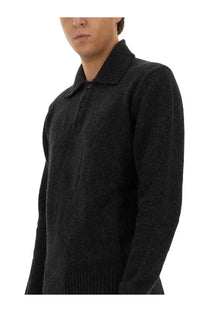 Dolce &amp; Gabbana men’s black wool polo sweater with textured knit and ribbed cuffs and collar