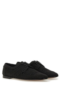Dolce &amp; Gabbana men’s black woven leather lace-up derby shoe with braided texture and low-profile sole