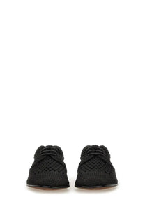 Dolce &amp; Gabbana men’s black woven leather loafers with a textured interlaced pattern and rounded toe