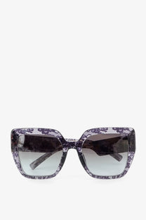 Dolce &amp; Gabbana women’s acetate sunglasses in black with black and white lace-patterned square frames and gradient gray lenses