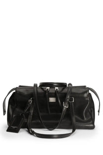 Dolce &amp; Gabbana women’s black leather duffle bag with silver-tone hardware and detachable shoulder strap