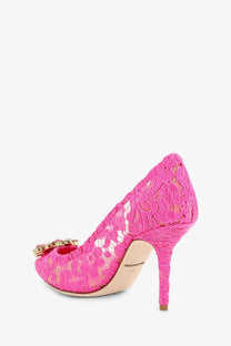 Dolce &amp; Gabbana women’s bellucci lace pump in vibrant pink with high heel and gold-toned buckle detail at the toe