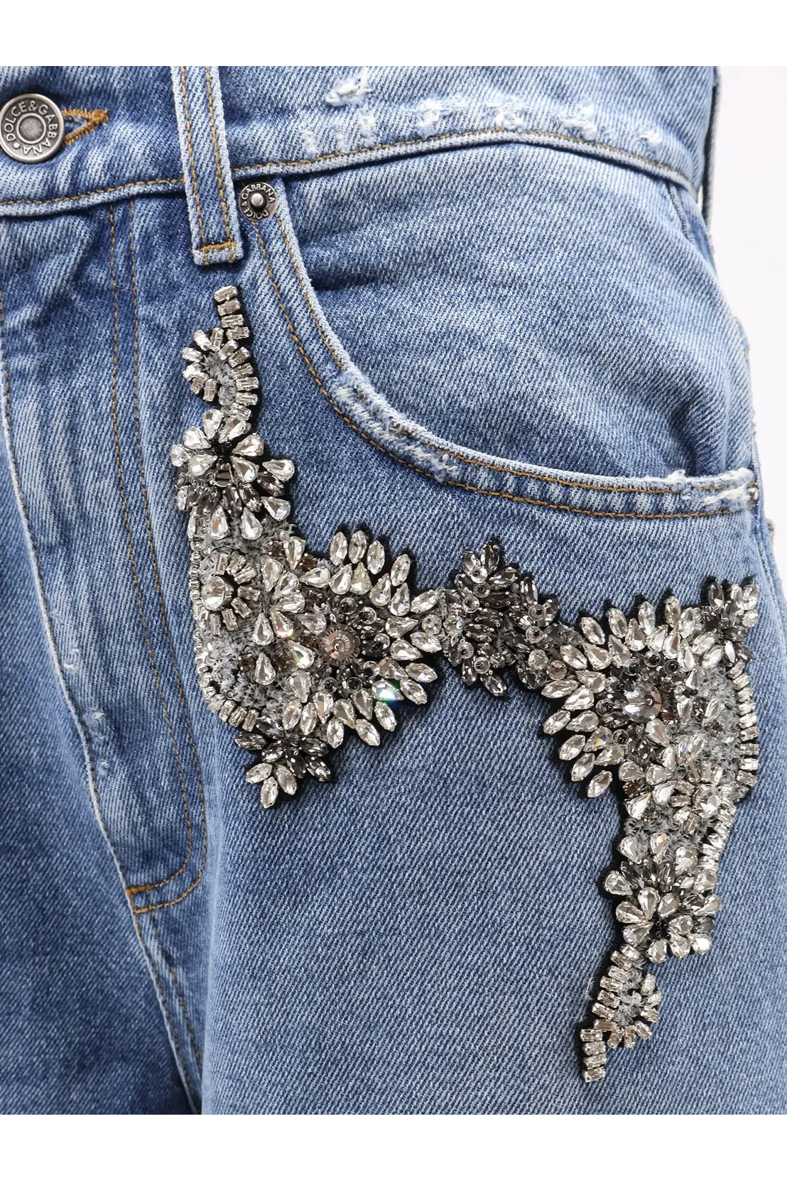 Dolce &amp; Gabbana women’s blue denim jeans with a sparkling silver beaded floral appliqué on the front
