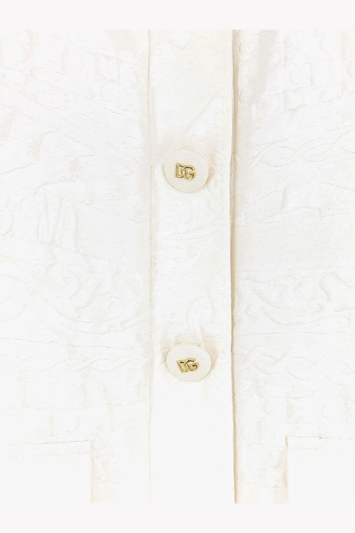 Dolce &amp; Gabbana women’s white brocade blazer with textured fabric and cream buttons featuring gold DG logo