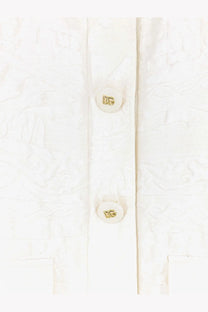 Dolce &amp; Gabbana women’s white brocade blazer with textured fabric and cream buttons featuring gold DG logo