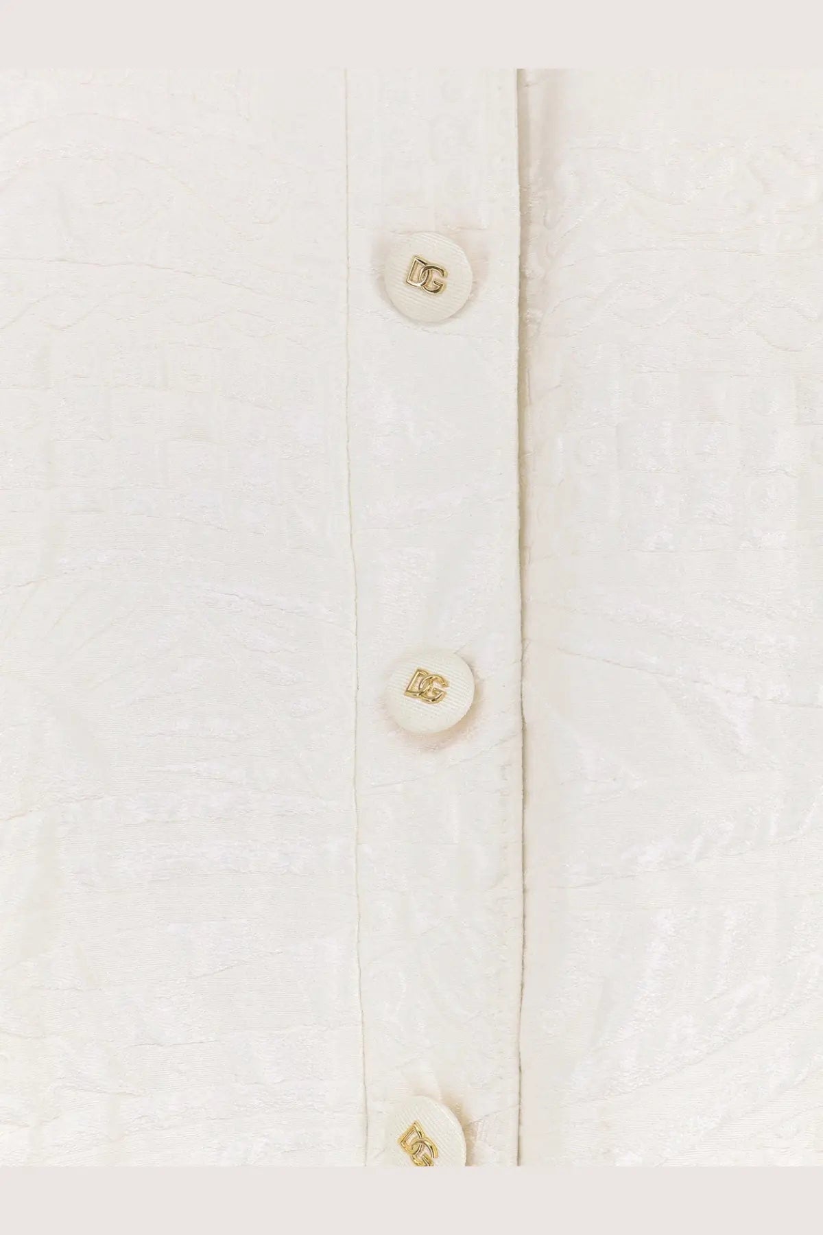 White buttons with gold-tone dg logo on dolce &amp; gabbana women’s brocade white coat