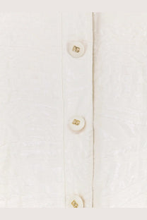 White buttons with gold-tone dg logo on dolce &amp; gabbana women’s brocade white coat