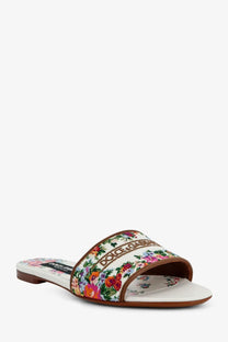 Dolce &amp; Gabbana women’s canvas slide sandal with floral pattern white sole and brown leather trim in gold tones