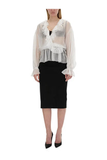 Dolce &amp; Gabbana women’s sheer white chiffon blouse with ruffles long sleeves and v-neckline worn over black skirt