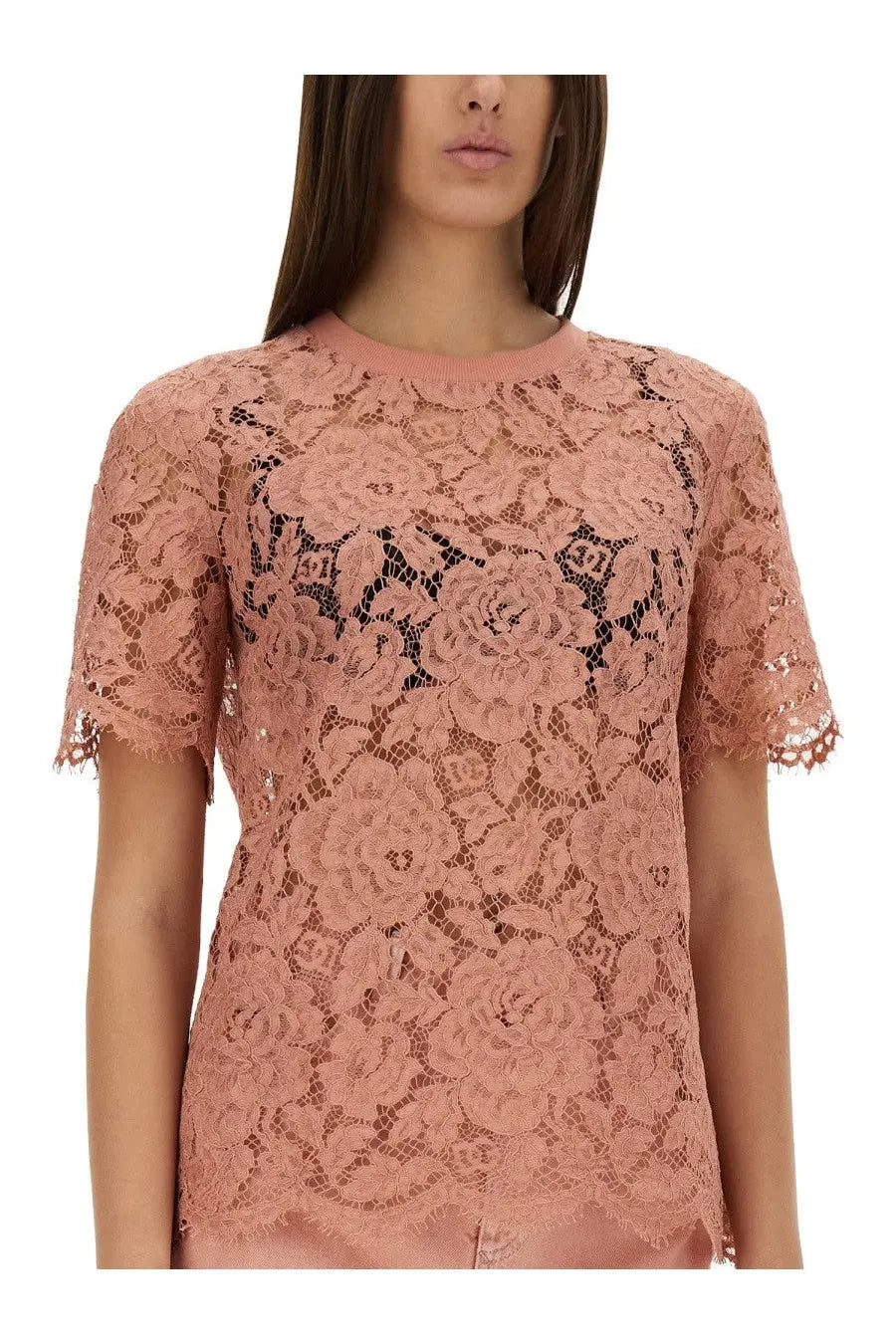 Dolce &amp; Gabbana women’s pink cordonetto lace top with short sleeves and round neckline featuring floral pattern