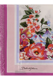 Dolce &amp; Gabbana women’s cotton beach wrap in pink with vibrant floral pattern and fringed edge