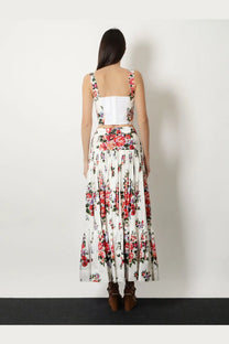 Dolce &amp; Gabbana women’s white cotton blend bustier crop top paired with white floral print pleated maxi skirt
