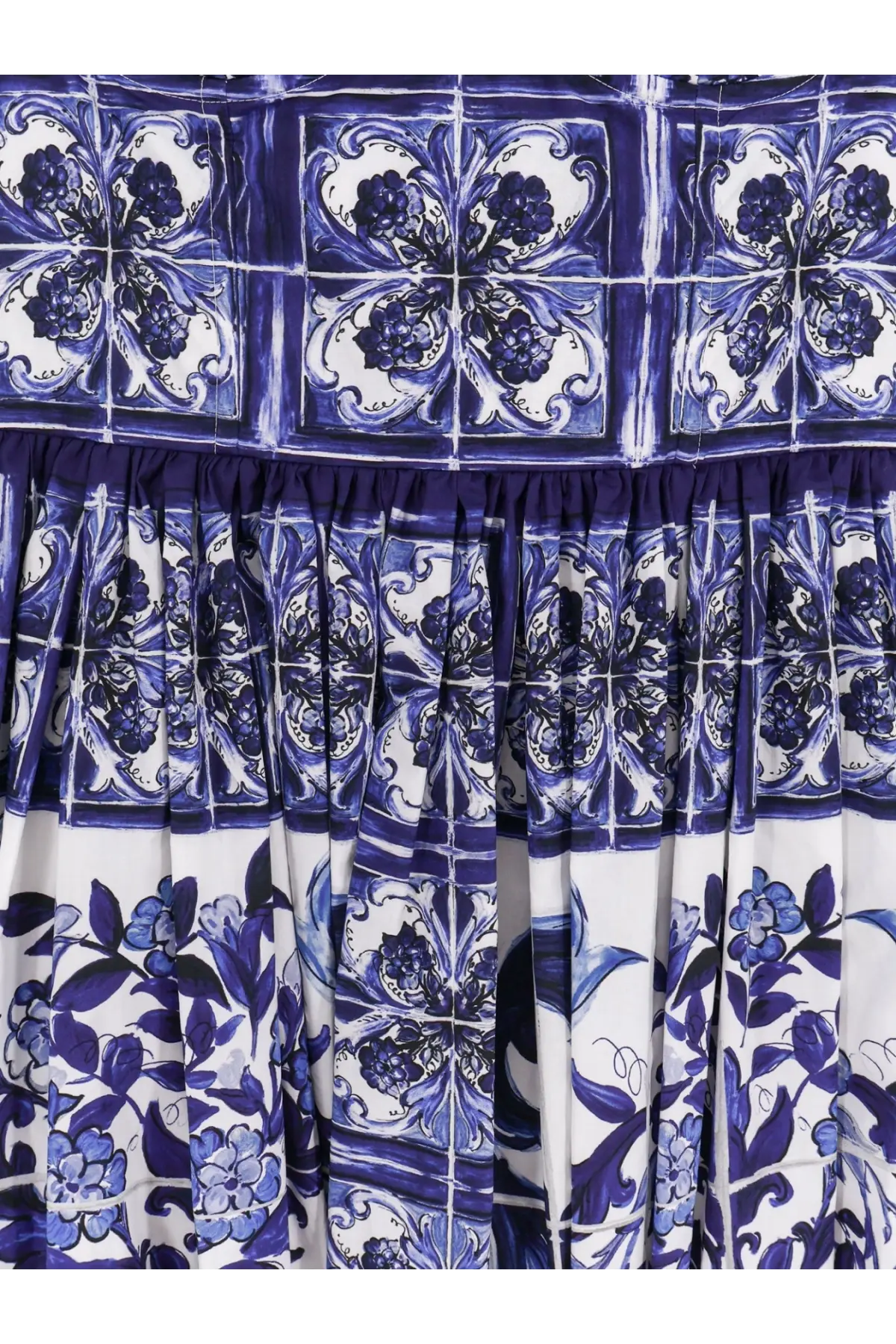 Dolce &amp; Gabbana women’s cotton dress with a flowing skirt featuring vibrant blue and white tile-inspired floral patterns