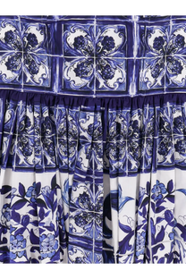 Dolce &amp; Gabbana women’s cotton dress with a flowing skirt featuring vibrant blue and white tile-inspired floral patterns