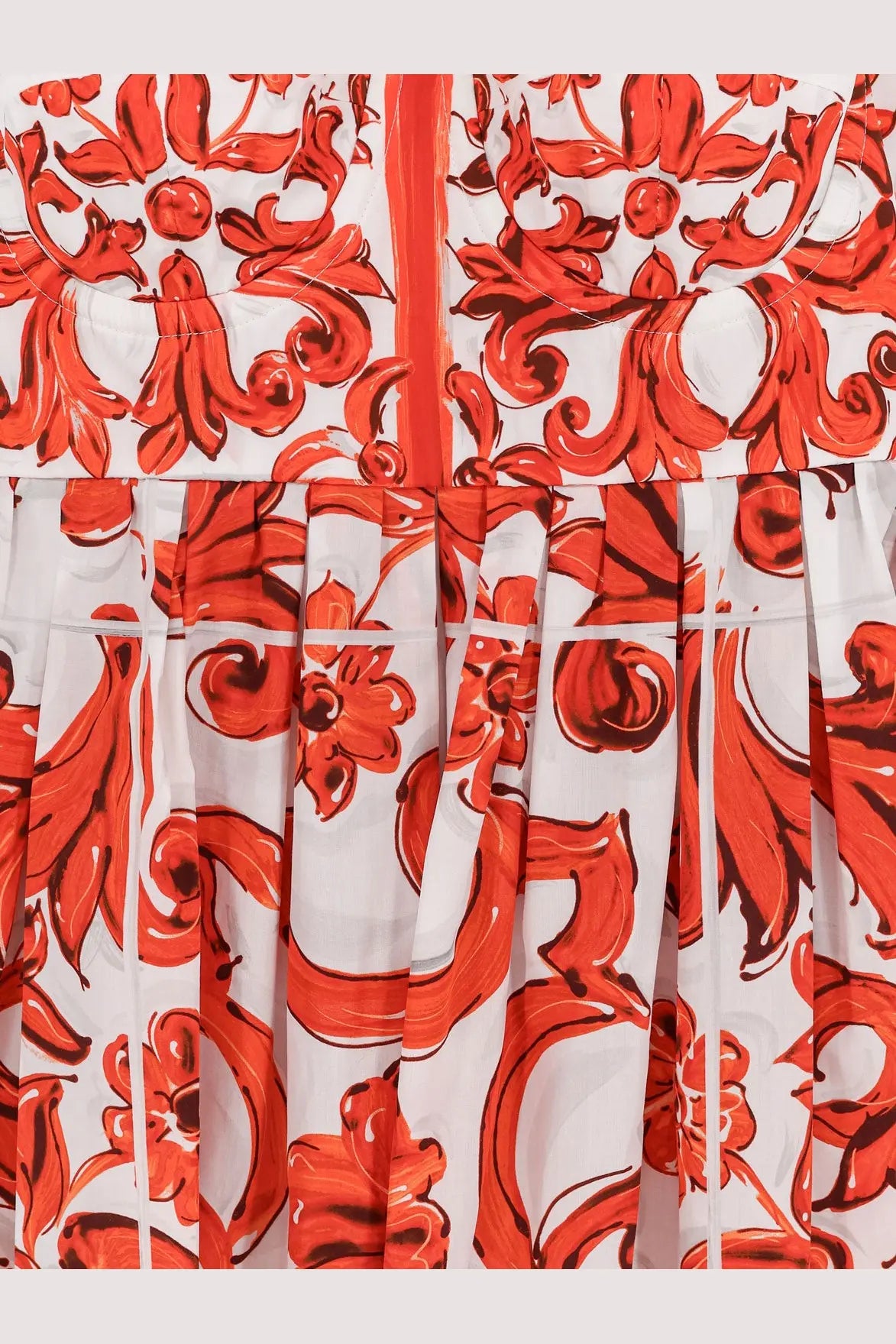 Dolce &amp; Gabbana women’s white cotton dress with bold red floral scrollwork and pleated skirt