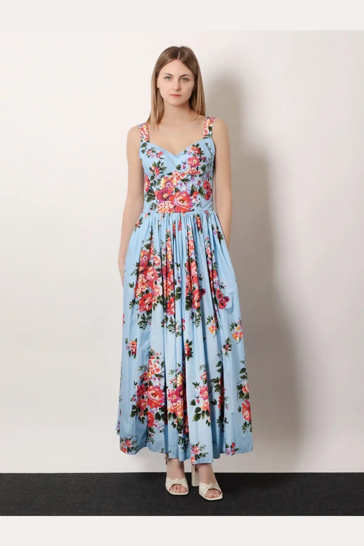 Dolce &amp; Gabbana women’s cotton light blue floral maxi dress with fitted bodice and pleated skirt featuring red roses
