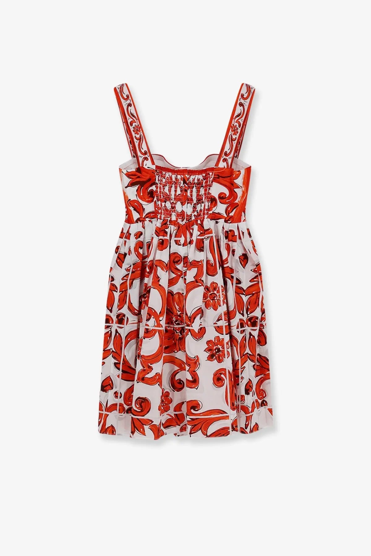 Dolce &amp; Gabbana women’s white cotton sleeveless dress with red floral pattern ornate scrollwork and smocked neckline
