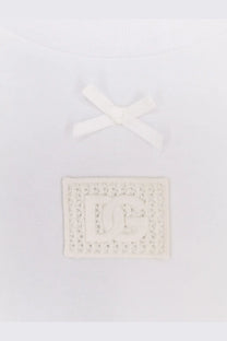 Dolce &amp; Gabbana women’s white cotton shirt with white lace patch embroidered dc logo and matching ribbon bow above it
