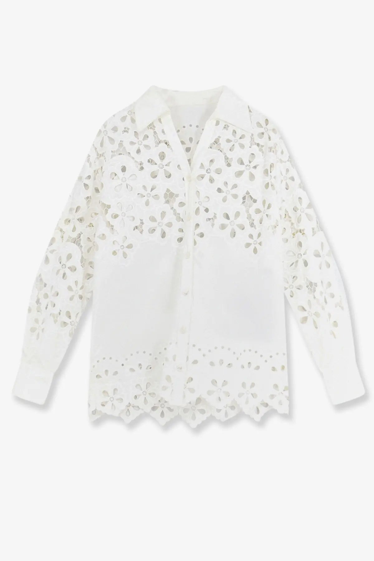 A delicate white cotton eyelet blouse by Dolce &amp; Gabbana with intricate floral cutouts on collar sleeves and hem
