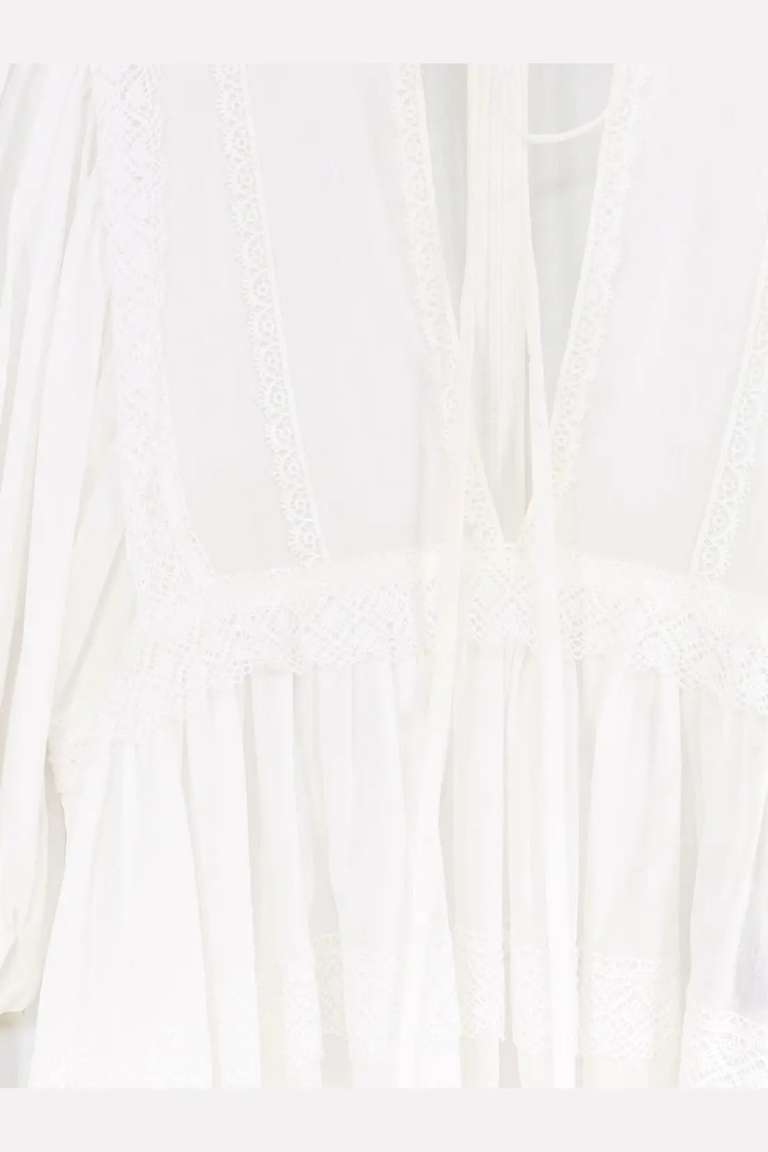 Dolce and Gabbana women’s white cotton shirt with flowing dress style and delicate lace trim on neckline and waistband