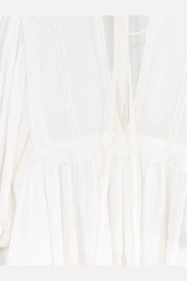 Dolce and Gabbana women’s white cotton shirt with flowing dress style and delicate lace trim on neckline and waistband