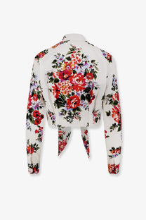 Dolce &amp; Gabbana women’s white cotton cropped blouse with floral print long sleeves and tie-back detail shown from back