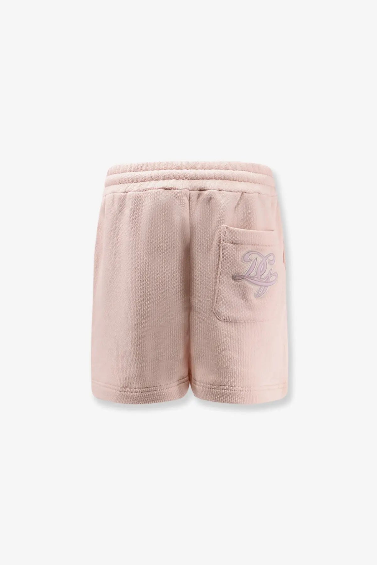 Back view of pastel pink dolce &amp; gabbana women’s cotton corduroy shorts with subtle embroidered logo on back pocket