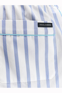 Dolce &amp; Gabbana women’s white and light blue striped cotton and silk shorts with a black brand label on the front pocket